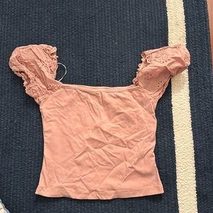 Pink eyelet puffed sleeve going out top